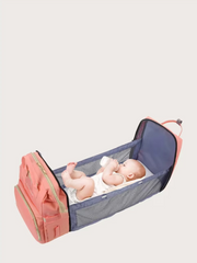 Rucsac Multifuncțional 3-in-1 pentru Bebeluși cu Pat Pliabil și Saltea, Roz Deschis – Impermeabil, Spațios, 39x30x18 cm